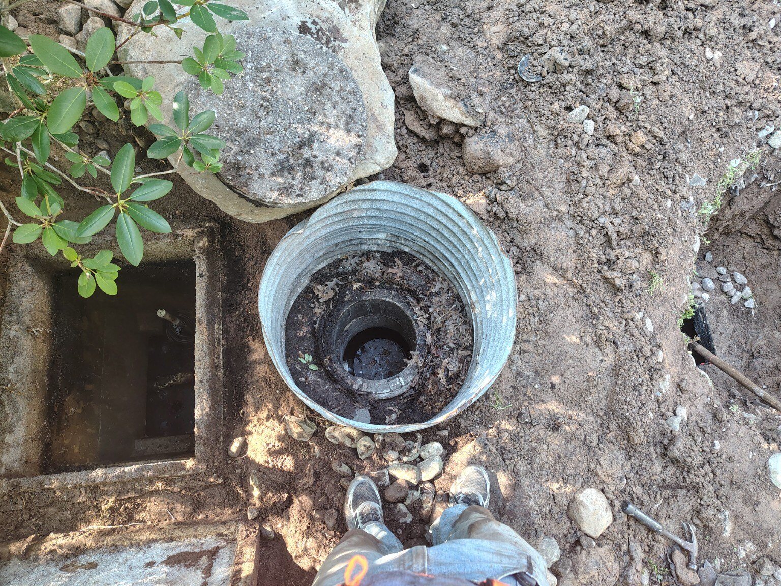 Exposed buried pump access and riser