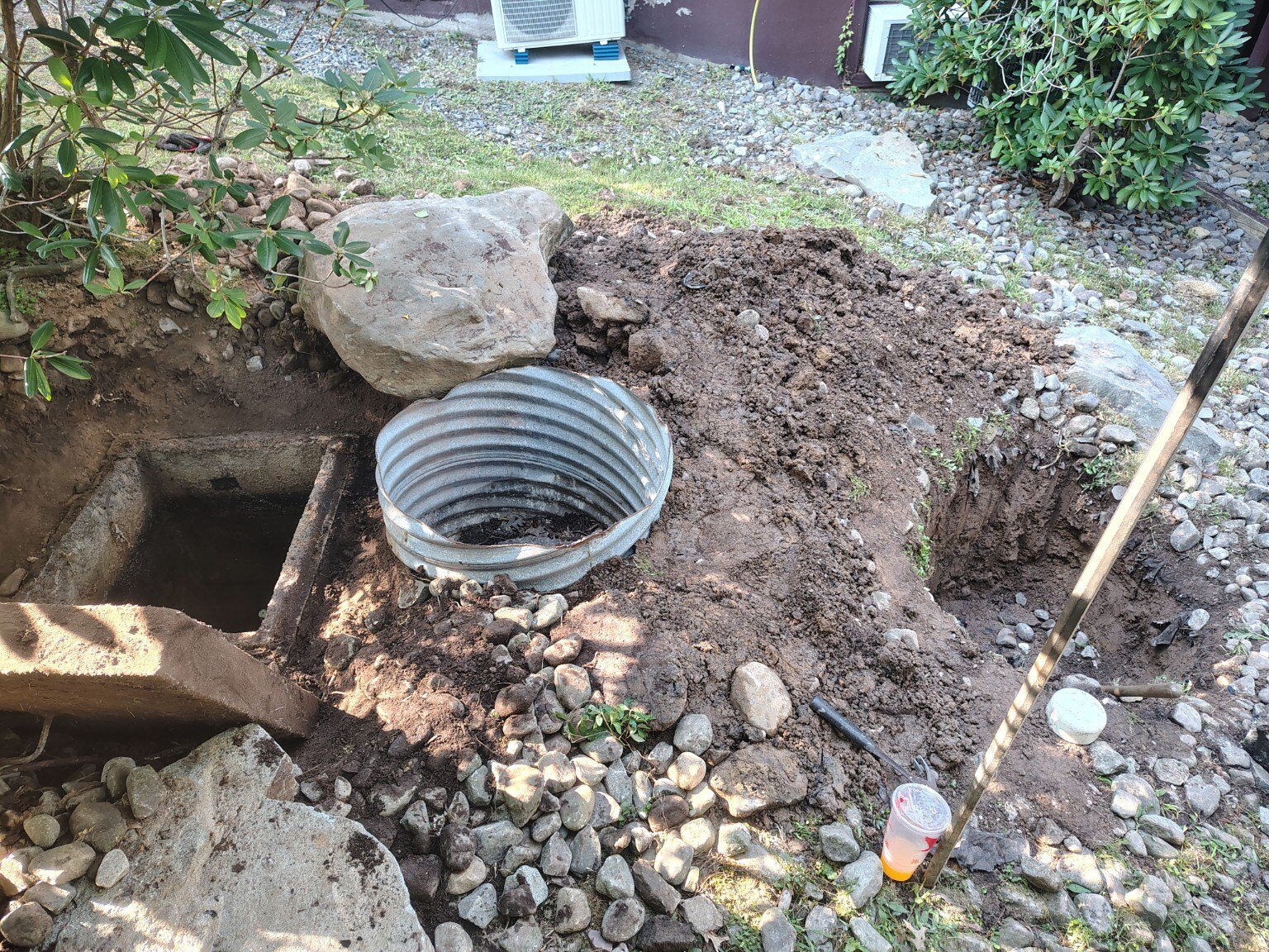 Carey's Enterprise field work exposing buried pump-station access